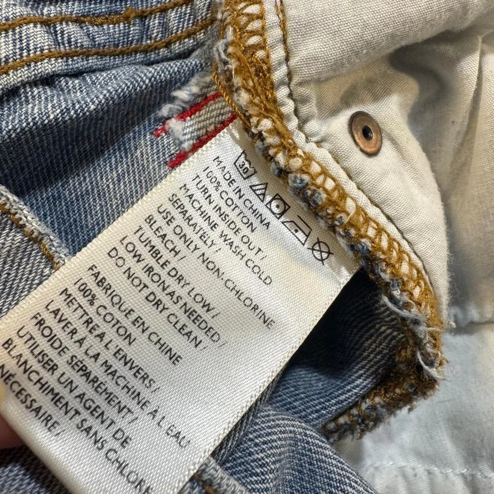 BDG Distressed blue denim shorts with frayed hem